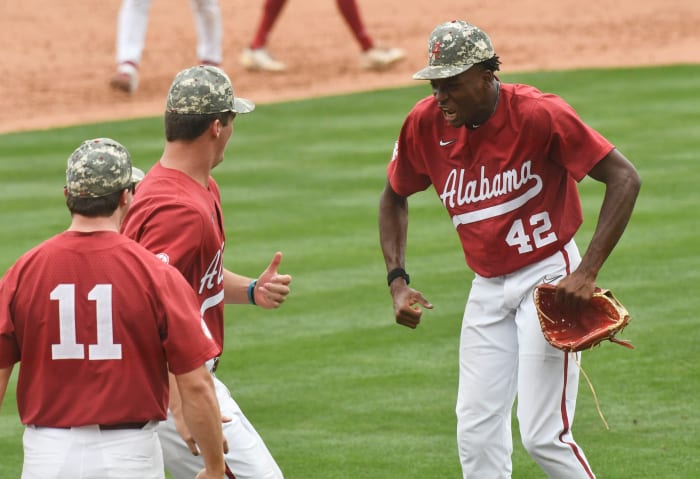 Alabama pitcher Alton Davis II (42) reacts after pitching the final inning to close out the Crimson Tide victory over Vanderbilt. Alabama defeated Vanderbilt 2-1 to claim the weekend series two games to one Saturday May 6, 2023, at Sewell-Thomas Stadium.